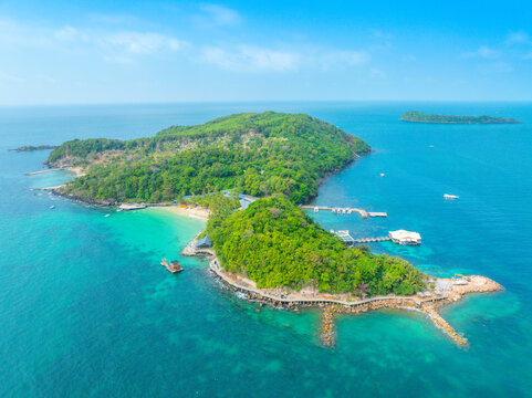 Aerial view of beautiful landscape, tourism boats, and people swimming on the sea and beach on May Rut and Mong Tay island in Phu Quoc, Kien Giang province, Vietnam