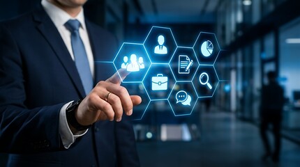 Obraz premium Businessman interacting with digital interface icons for communication and data analysis