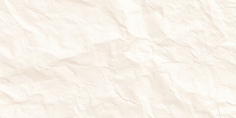 Fototapeta premium Crumpled beige paper texture background with wrinkles and creases for design and craft projects
