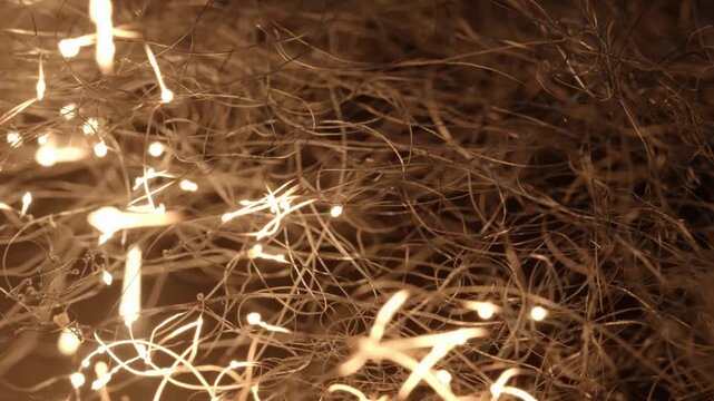 Warm and cozy tangled string lights in a rustic setting with soft glowing bulbs