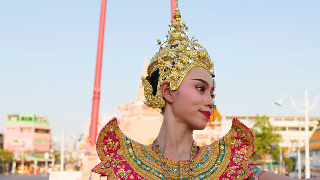 Thai Khon Dancer in Ornate Gold Costume at Giant Swing Bangkok