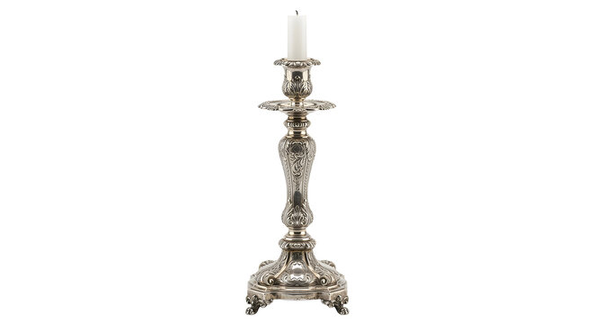 Elegant vintage silver candlestick with white candle