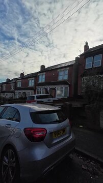 Car Mounted Camera Streets View Vertical Footage of Central Birmingham Perry Barr City of England Midlands of United Kingdom. Footage Was captured on 26th November, 2025 During Cloudy and Cold Sunset