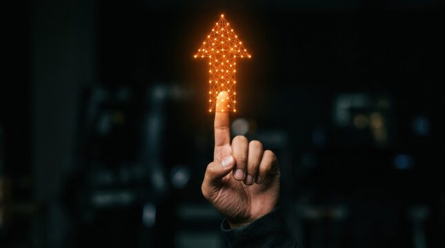 Futuristic hand pointing upward with glowing orange arrow Sales enablement programs enhance effectiveness by combining