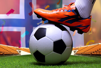 Close up legs and feet of soccer player or football player walk on green grass ready to play match on national Ivory Coast and national Norway. © Narin Sapaisarn