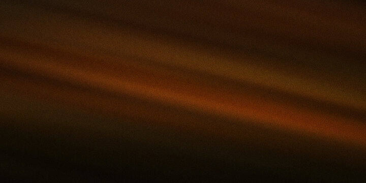 Abstract dark background with subtle diagonal light rays creating textured atmosphere and warm glowing highlights.