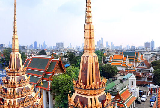 Aerial view cityscape of Bangkok with modern and old residential neighbourhood. Top view of Bangkok from Wat Ratchanaddaram Worawiha, Thailand. Topic of summer vacation, relaxing, travel, trip, cruise