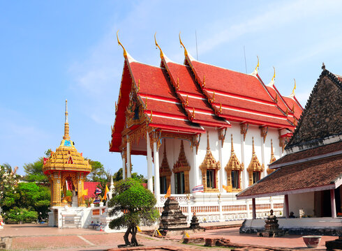 Buddhist temple in traditional Thai style, Thailand. Shrine in Buddhist temple, reflecting the traditional architecture of Thailand. Topic of vacation, travel, trip, cruises, tour