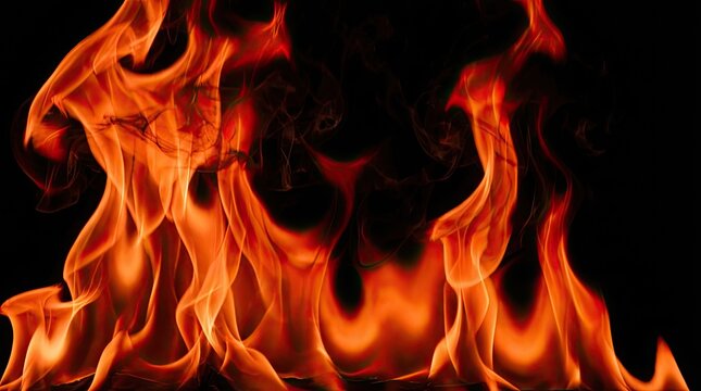 Fire frame with black background and flames concept. Close-up view of vibrant flames dancing against a dark backdrop.