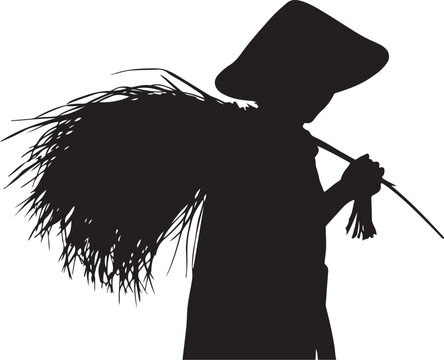 Silhouette of a person carrying a bundle of straw