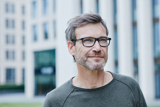 Confident mature man outdoors