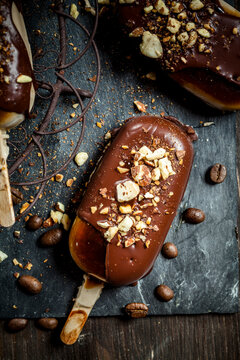 Espresso and coconut-cream ice lollies with chocolate and roasted almonds