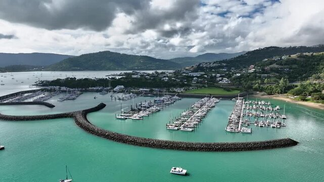 Spectacular cinematic aerial footage of Cannonvale Airlie Beach Whitsundays Queensland Australia