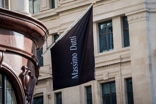 LONDON, UK. 16th  February 2025. A black promotional flag with the Massimo Dutti brand name hanging from the historic building facade of its flagship retail store on Regent Street.