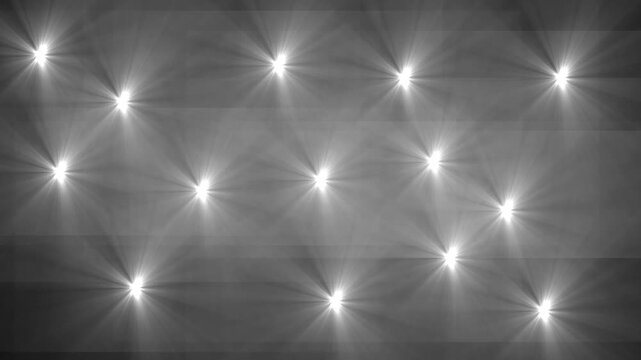 Cinematic light flash- Paparazzi camera flashes animation. Animation of white camera flashes on black screen. Array of Bright Lights Emitting Rays in a Grid Pattern