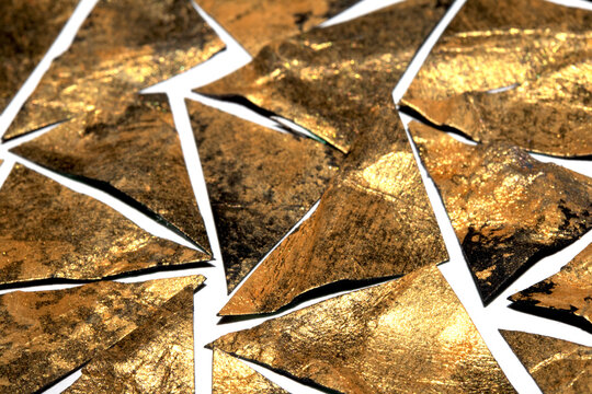 Gold metallic geometric triangle paint background