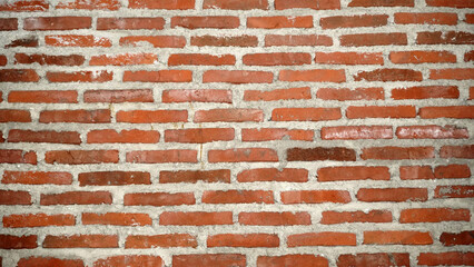 Fototapeta premium Classic red brick wall with white mortar joints.