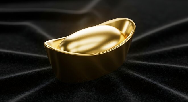 Gold nugget on black velvet fabric surface