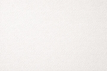 Fototapeta premium Elegant white floral paper texture with delicate embossed botanical pattern. Perfect for backgrounds, stationery, and soft minimalist or wedding-themed designs.