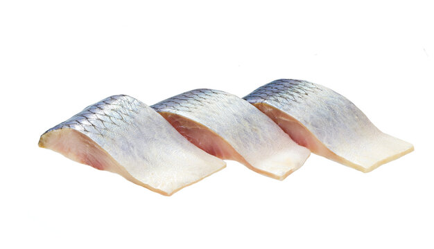 Pieces of herring isolated on white background.
Atlantic herring slices, isolated on white background.