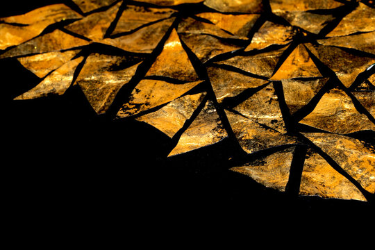 Gold metallic geometric triangle paint background