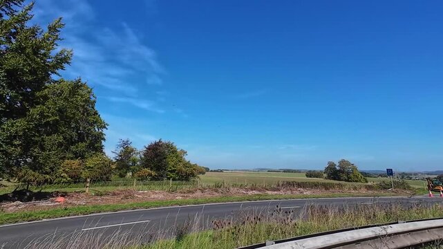 Car Drive on British Highways. Car Mounted Camera Time Lapse Footage of British Road Travel and Traffic During Blue Sky and Mostly Sunny Day Drive on British Motorways and Highways of England UK