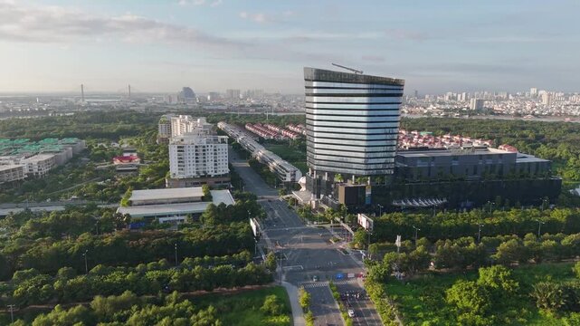 Aerial Drone View of Thisofic Tower and Sala Urban Area with Ho Chi Minh City Skyline at Sunrise, Vietnam