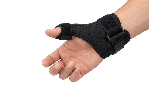 Black thumb stabilizer brace on human hand, orthopedic wrist support for injury recovery, medical compression splint for carpal tunnel and sprain relief isolated on Transparent Background