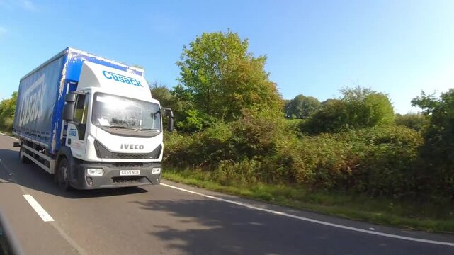 Car Drive on British Highways. Car Mounted Camera Time Lapse Footage of British Road Travel and Traffic During Blue Sky and Mostly Sunny Day Drive on British Motorways and Highways of England UK