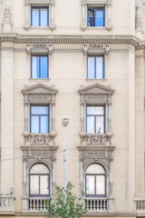 Fototapeta premium Barcelona, Building Facade, Historic Eixample District, Neo Classical Architecture, Sculpted Reliefs