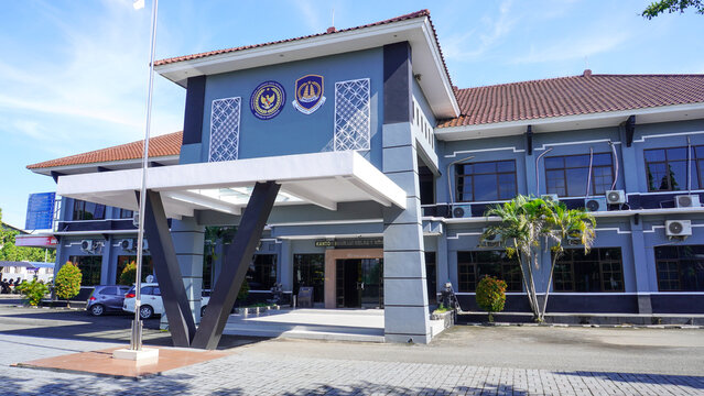 Front view of the Pati Class I Non-Tax State Revenue Immigration Office (Kantor Imigrasi Kelas I Non TPI Pati) building with a clear blue sky background. This government facility provides passport.