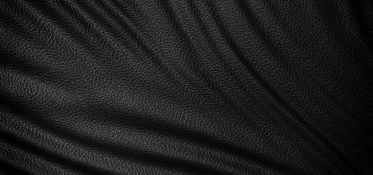 Realistic dark black and green luxury leather texture background with elegant folds