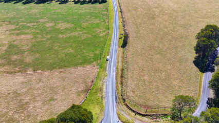 Obraz premium Aerial View of Rural Road and Farmland in Dorrigo Australia