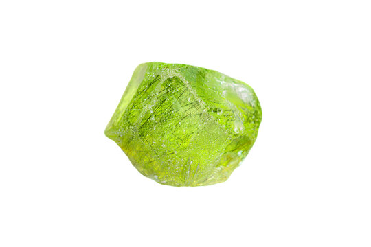 Rare natural rough ludwigite in peridot gemstone from Pakistan (Ludwigite is a magnesium-iron borate mineral) (selective focus)