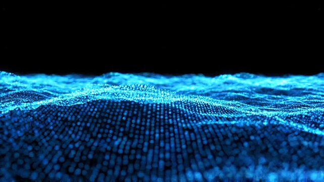 Digital Ocean An abstract representation of data visualized as an undulating wave composed of glowing blue particles against a dark background