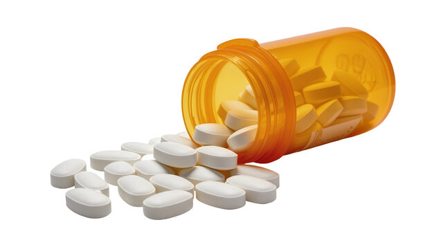 Orange prescription bottle spilling white oval pills