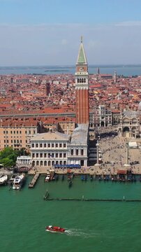 Iconic St Marks Square in Venice surrounded by historic architecture and vibrant tourist atmosphere in the heart of the city.
