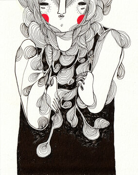 A girl holding black and white lines