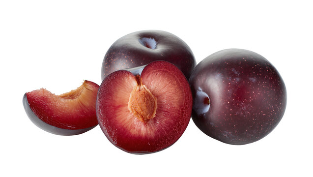 Whole and halved ripe plums with a slice