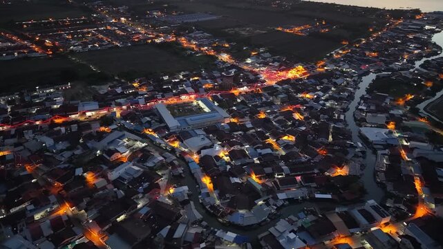 Aerial Night View of Tanjung Piandang with Red Lanterns