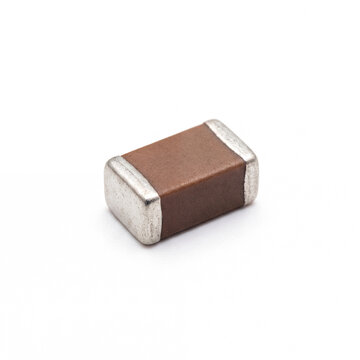 Generic SMD multilayer ceramic capacitor isolated on white.