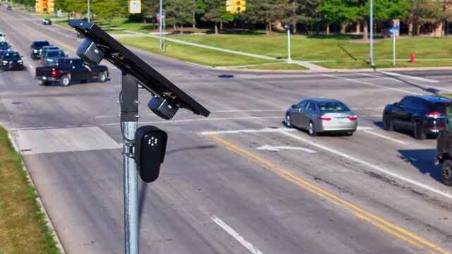 Solar powered Flock license plate reader cameras monitoring traffic in Brownstown, MI, USA