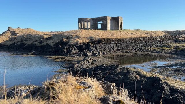 Abandoned Structure On The Hopsnes Peninsula Near Grindavik In Iceland. - reveal shot