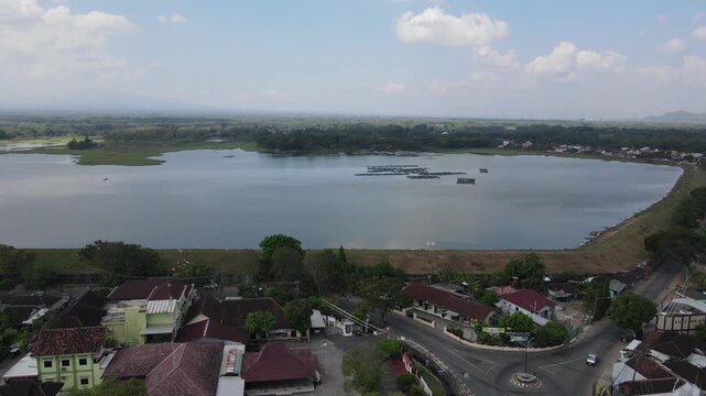 Aerial view of Mulur Reservoir, a natural tourist destination and reservoir, a Dutch heritage site built in 1926 in Sukoharjo, Central Java, Indonesia.