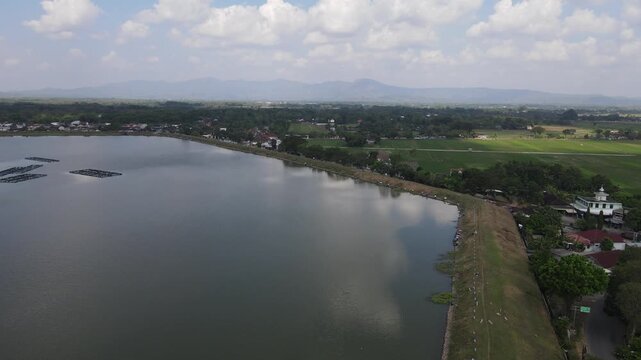 Aerial view of Mulur Reservoir, a natural tourist destination and reservoir, a Dutch heritage site built in 1926 in Sukoharjo, Central Java, Indonesia.