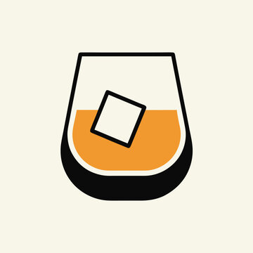 Whiskey in a glass with ice cube