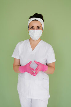 Medical Specialist In Face Mask Wearing Gloves