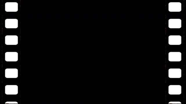 Vintage looping film strip with black transparent background. 4K alpha channel
