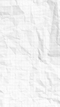 Crumpled graph paper unfolding stop motion animation for education and school texture background.Video effect 4k