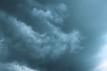 Fototapeta premium Dark dramatic storm clouds before heavy rain texture background